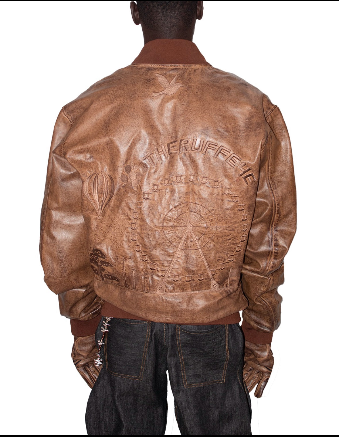 RUSTED LEATHER VARSITY JACKET IN BROWN